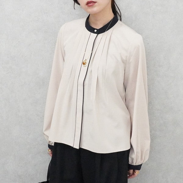 フロントタックバイカラーブラウス