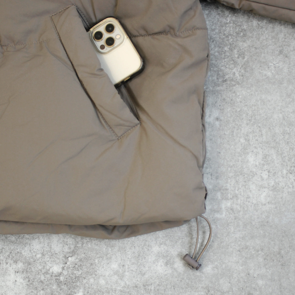 スタンドフードフェイクダウンコート