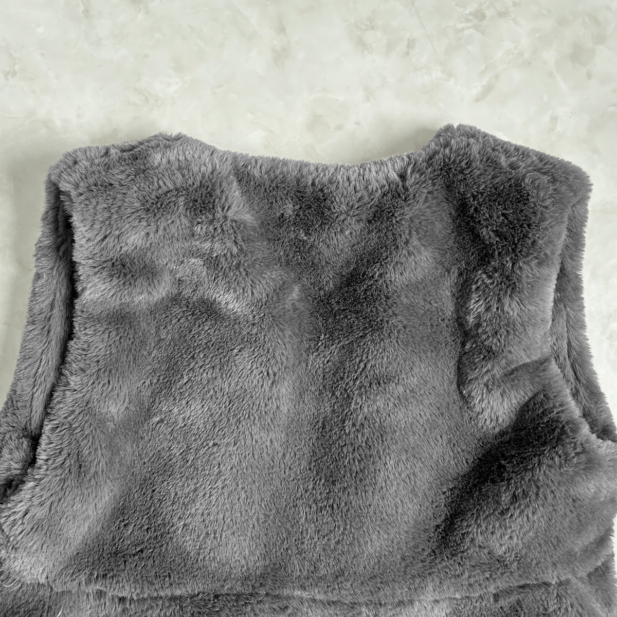 ラビット風ペプラムファーベスト