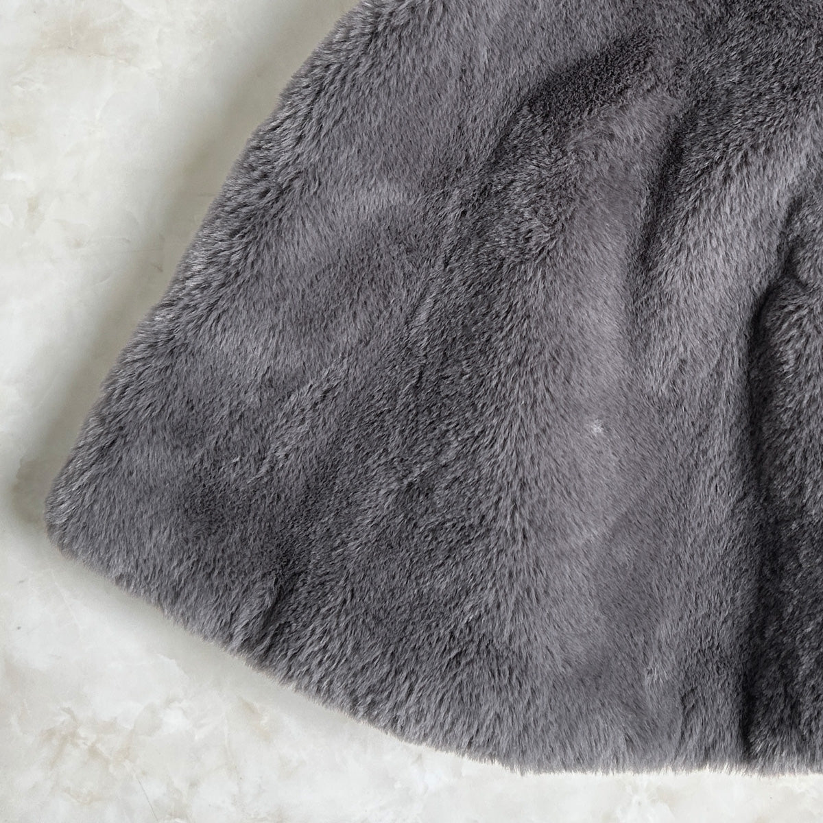 ラビット風ペプラムファーベスト