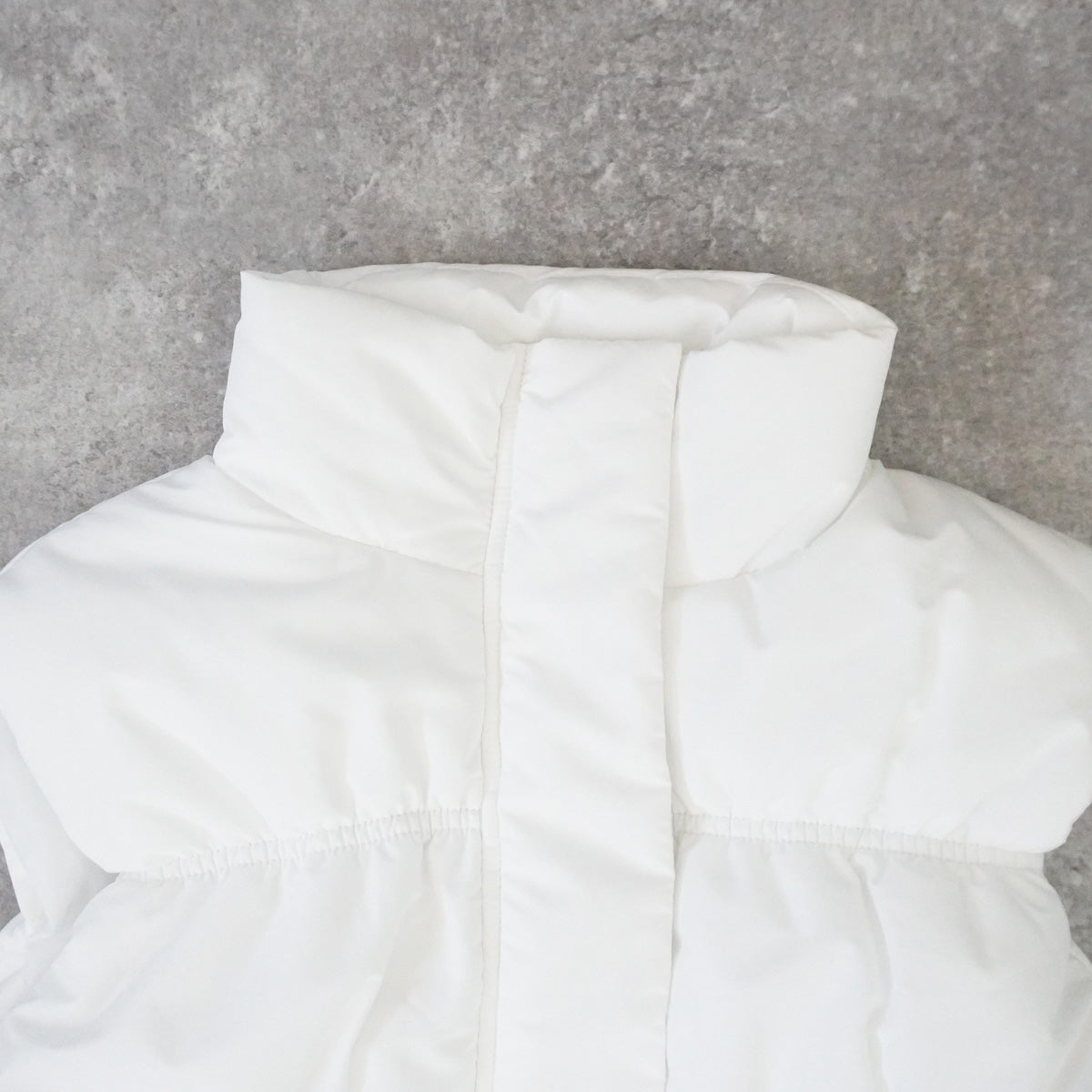 裾ドロストショート中綿ベスト