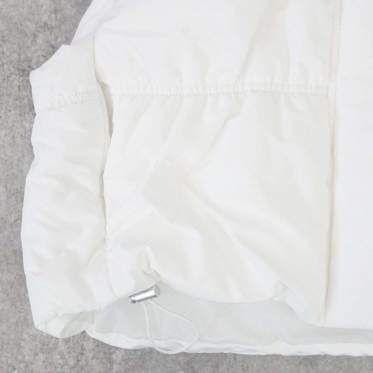 裾ドロストショート中綿ベスト