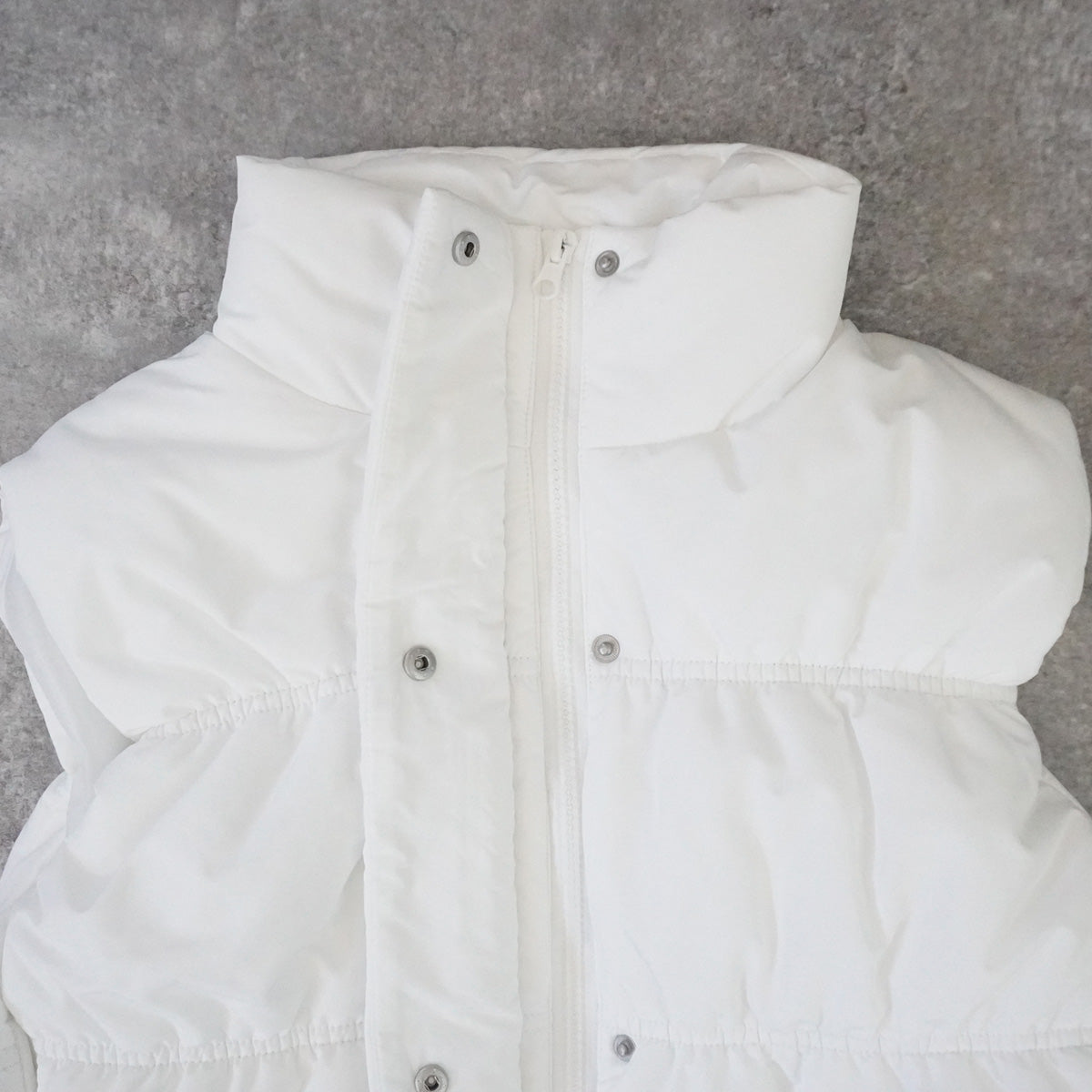 裾ドロストショート中綿ベスト