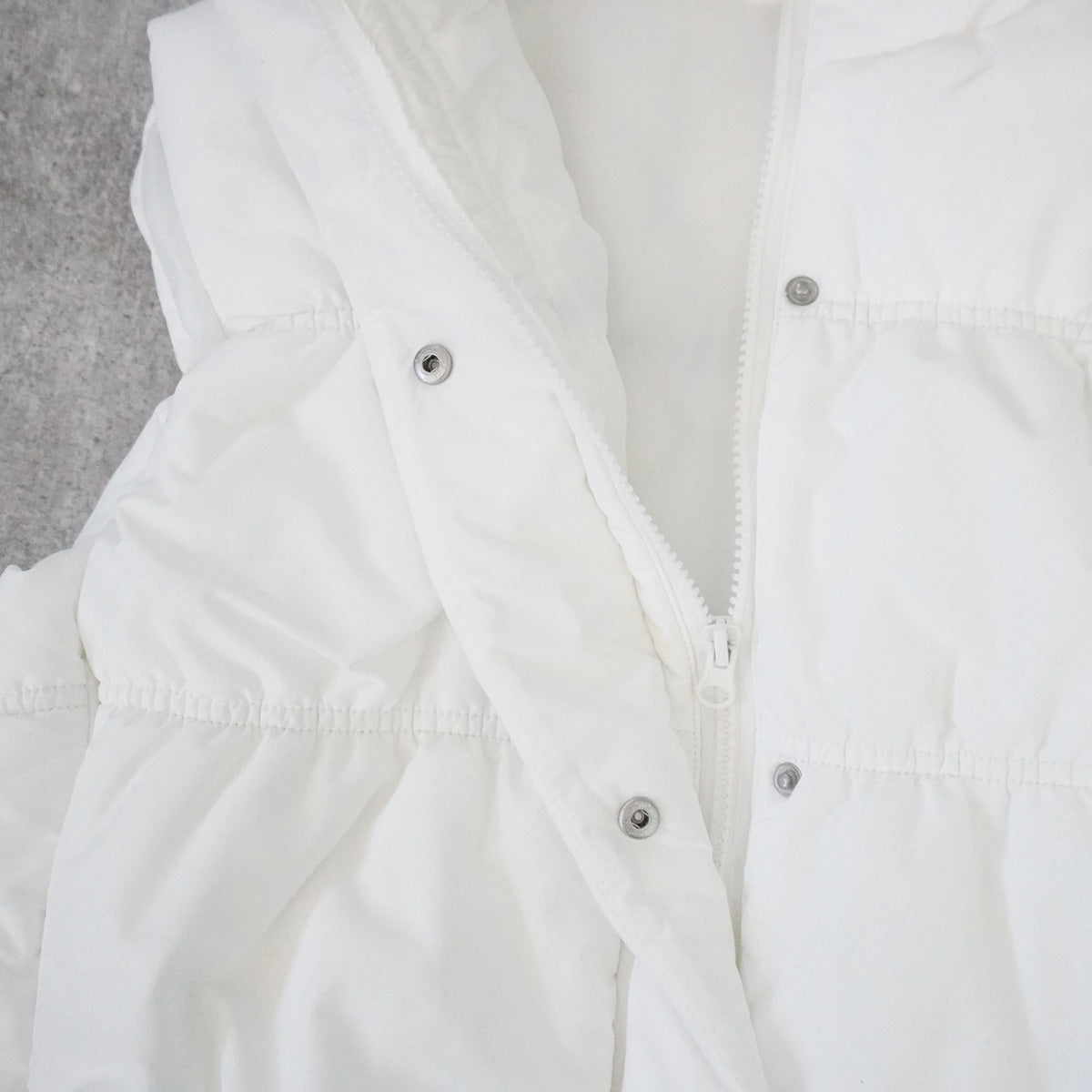 裾ドロストショート中綿ベスト