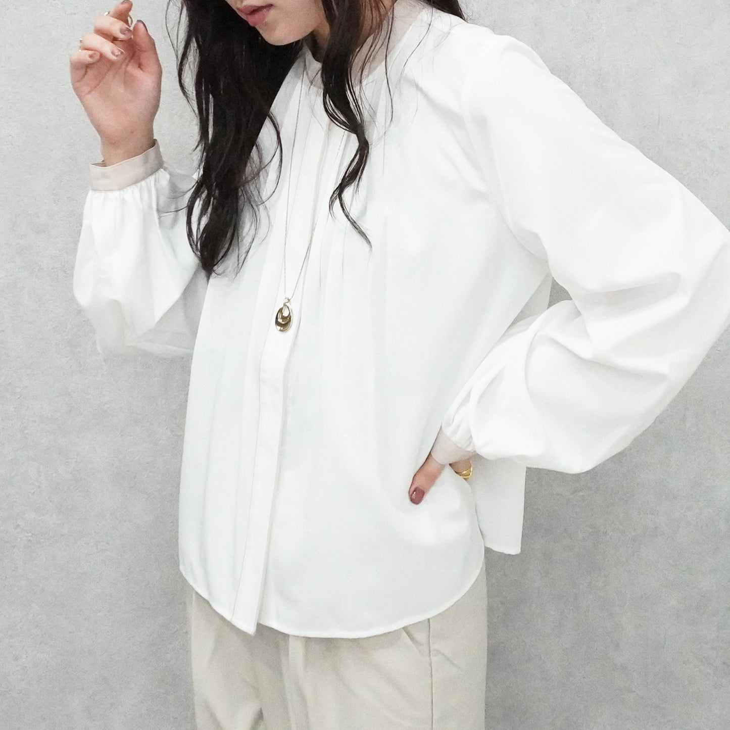 フロントタックバイカラーブラウス