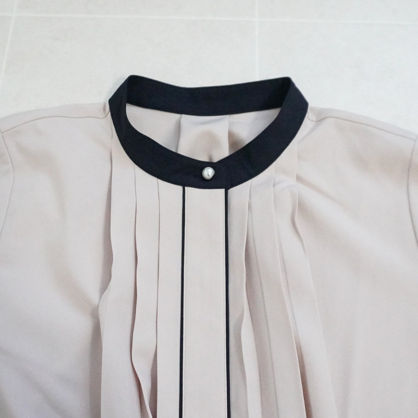 フロントタックバイカラーブラウス