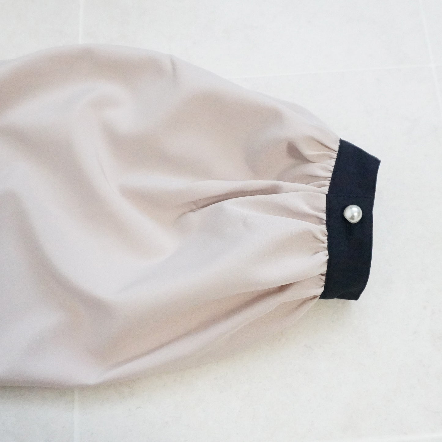 フロントタックバイカラーブラウス