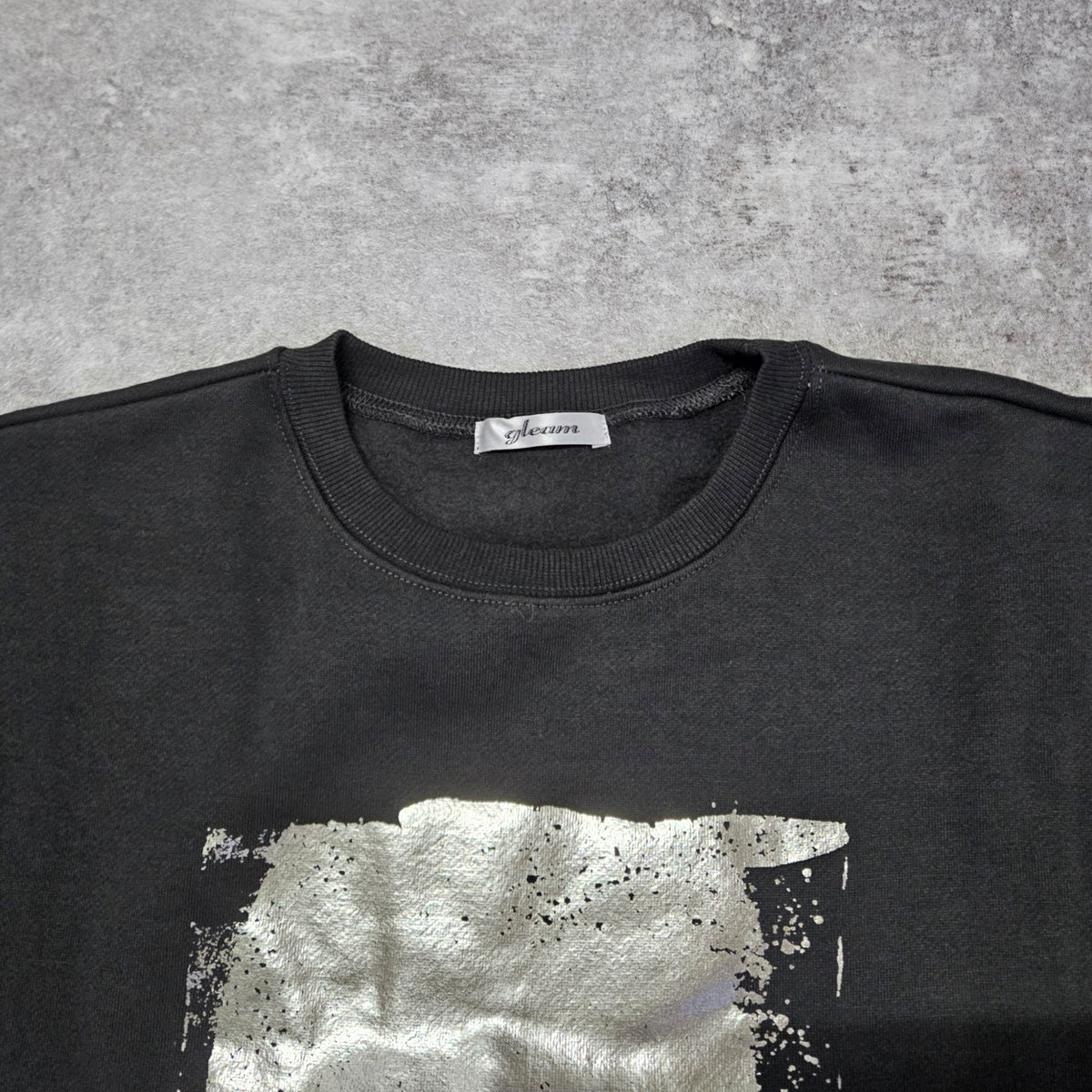 箔プリントプルオーバー