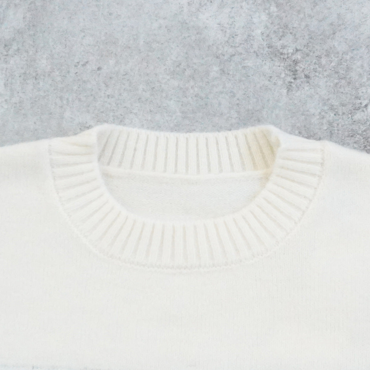 フェザーロゴニットプルオーバー