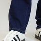 細見えテーパードデニムパンツ
