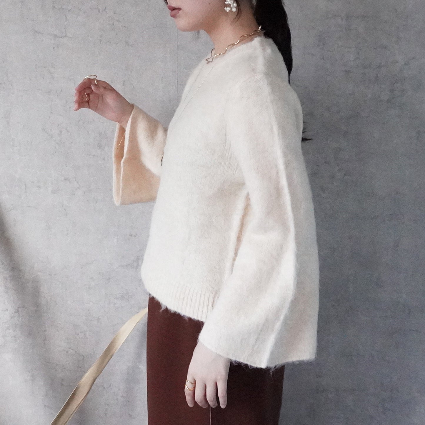 シャギーフレアスリーブニット